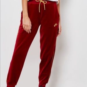 Nike red velour trackpants